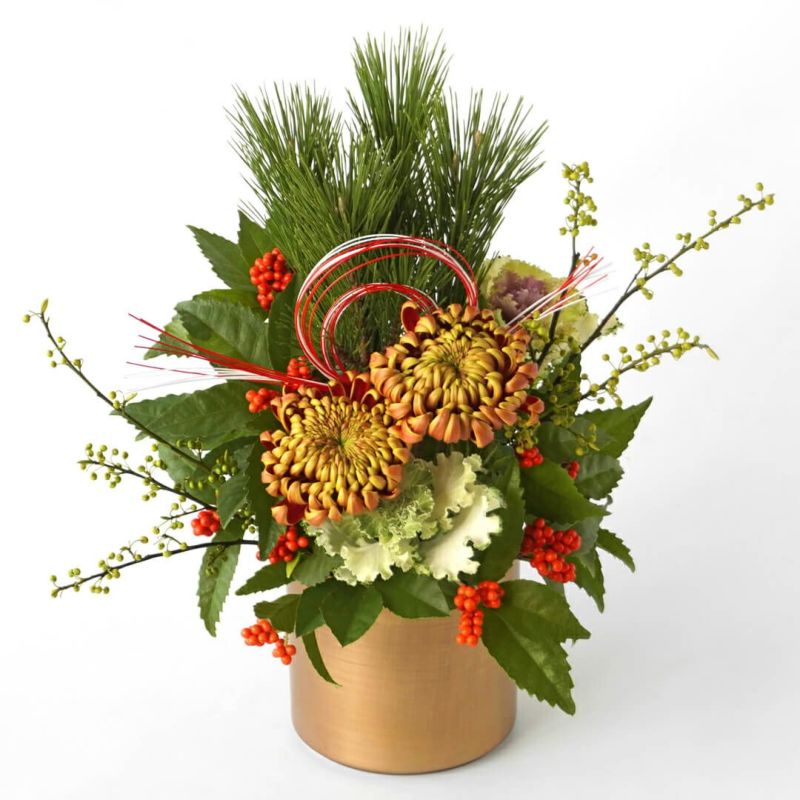 オレンジの複色のマムのアレンジメント